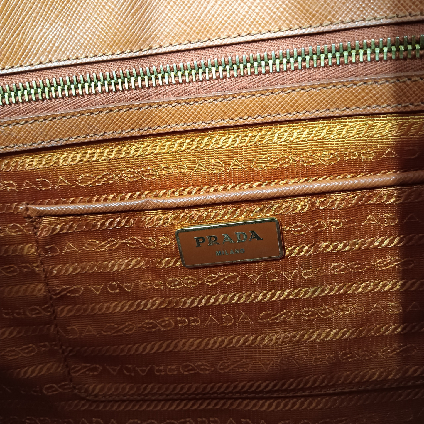 PRADA Handbag Orange Stain